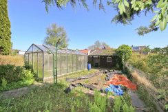 Vrijstaande karakteristieke jaren 70 villa aan de Iepenlaan 14 @Zwanenburg met bijna 1000 m² grond, 60 meter tuin en 300 m² woonoppervlak Foto 21 tuin 01f