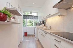 Goed onderhouden, ruim en zonnig 4-kamerappartement met zuid balkon en vrij uitzicht voor aan de Wijnmalenstraat 37 @Badhoevedorp Foto 05 Keuken 01a