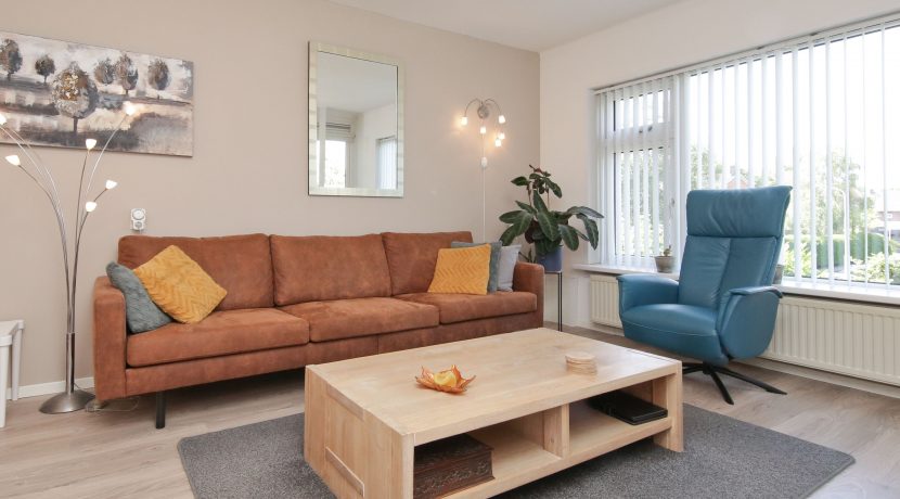 Goed onderhouden, ruim en zonnig 4-kamerappartement met zuid balkon en vrij uitzicht voor aan de Wijnmalenstraat 37 @Badhoevedorp Foto 09 Woonkamer 01c