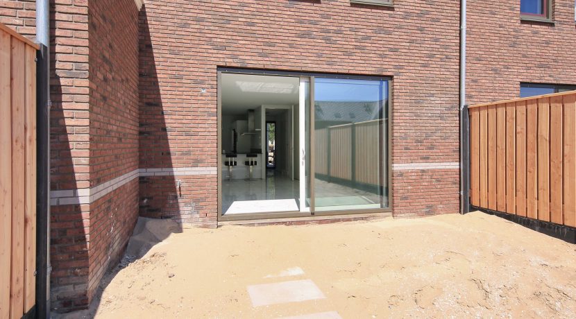 Wonen in een herenhuis, kan in deze kant en klare middenwoning, type Trocadéro in fase 1 Park Quatrebras @Badhoevedorp Lupinesingel 31 Foto 15 tuin 01c