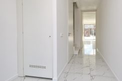 Wonen in een herenhuis, kan in deze kant en klare middenwoning, type Trocadéro in fase 1 Park Quatrebras @Badhoevedorp Lupinesingel 31 Foto 17 hal 01a