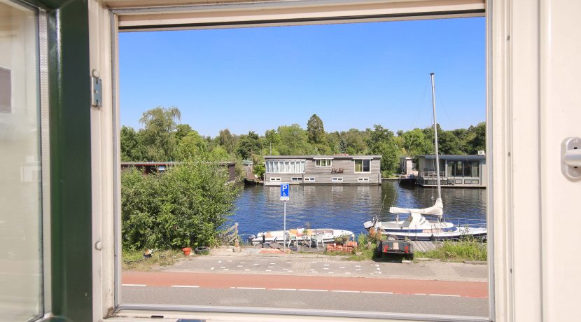 Charmante, half vrijstaande jaren dertigwoning met steiger aan de Nieuwemeerdijk 119 @Badhoevedorp foto 10