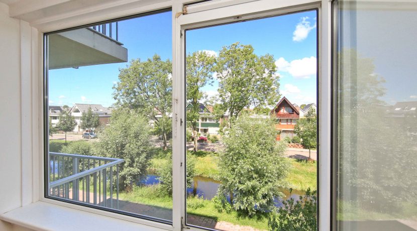 Deels gestoffeerd driekamerappartement op de tweede etage met dubbel balkon en vrij uitzicht @Badhoevedorp Einsteinlaan 131 is te huur voor twee jaar foto 12