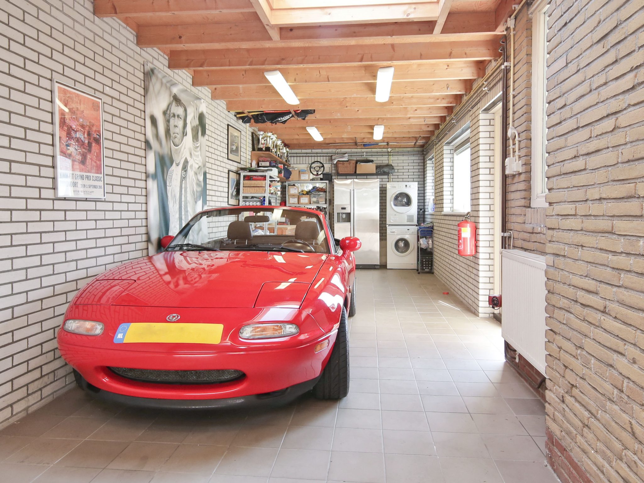 Half vrijstaande villa met grote garage en 110 m² zuidwest tuin op het mooiste plekje van het