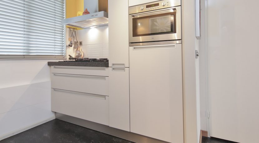 In deze ruime, aan de polder grenzende familiewoning aan de P.J. Oudstraat 14 woon je buiten de stad en toch @Amsterdam Foto 19