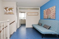 In deze ruime, aan de polder grenzende familiewoning aan de P.J. Oudstraat 14 woon je buiten de stad en toch @Amsterdam Foto 35