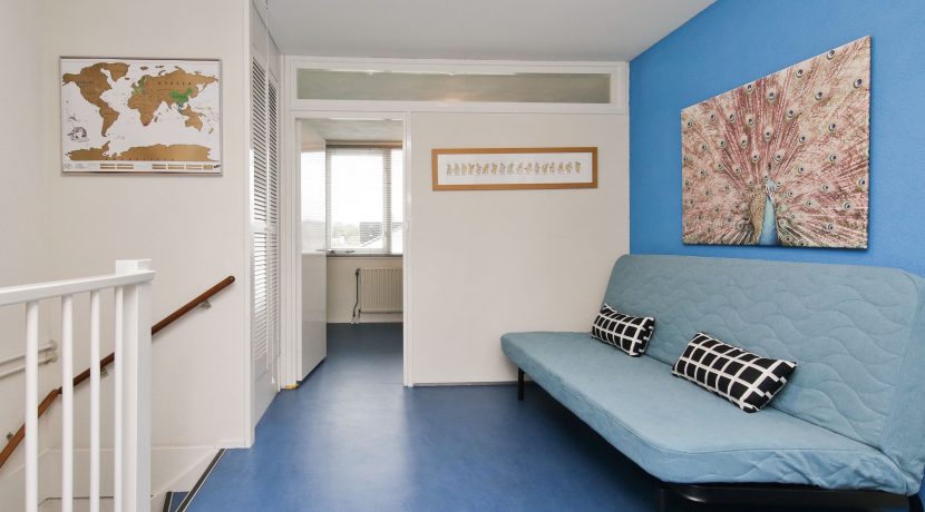 In deze ruime, aan de polder grenzende familiewoning aan de P.J. Oudstraat 14 woon je buiten de stad en toch @Amsterdam Foto 35