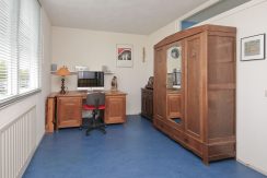 In deze ruime, aan de polder grenzende familiewoning aan de P.J. Oudstraat 14 woon je buiten de stad en toch @Amsterdam Foto 38