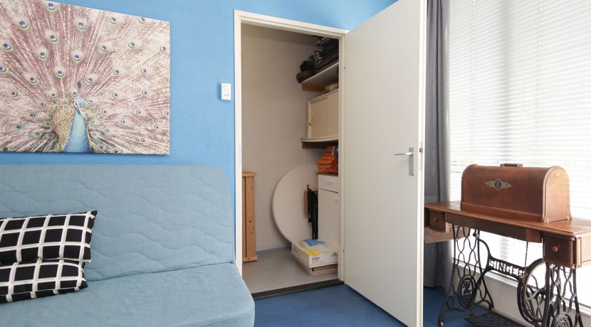 In deze ruime, aan de polder grenzende familiewoning aan de P.J. Oudstraat 14 woon je buiten de stad en toch @Amsterdam Foto 41