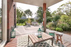 Omringd door groen en tuinen ligt dit vrijstaande woonhuis met garage op 450 m² eigen grond aan de Orchideelaan 208 @Badhoevedorp Foto 03