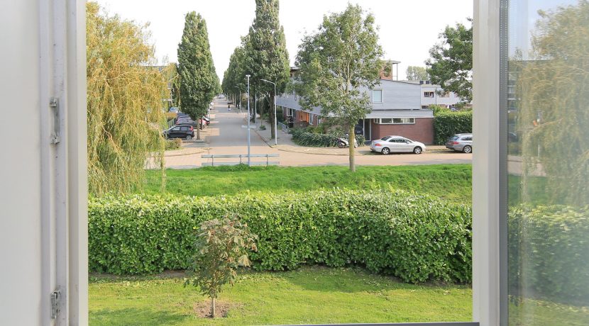 Omringd door groen en tuinen ligt dit vrijstaande woonhuis met garage op 450 m² eigen grond aan de Orchideelaan 208 @Badhoevedorp Foto 45