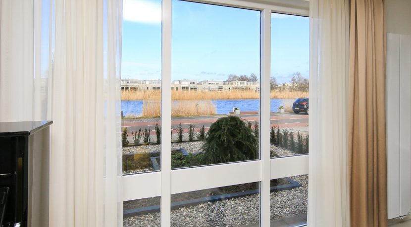Vrijstaande dijkvilla van 275 m² en 20 meter diepe ZW tuin @Lijnden Akerdijk 112 Foto 05 woonk 01c