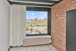 Helft van dubbele dijkwoning met vrij uitzicht en 21 meter ZW-tuin Akerdijk 139 @Badhoevedorp Foto 19 Woonkamer 01e