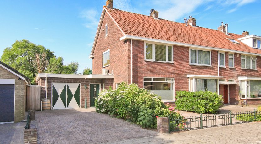 Karakteristieke hoekwoning met garage en Z-tuin @Badhoevedorp Sperwerstraat 37 Foto 01