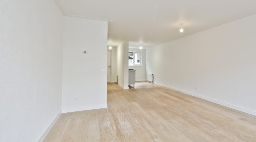 Licht familiehuis @Amsterdam Beverenstraat 18 foto 13 woonkamer 01c